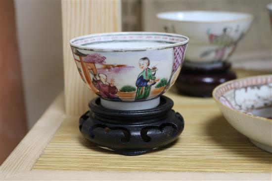 Three 18th century Chinese family rose tea bowls and two saucers, two other teabowls and three wood stands